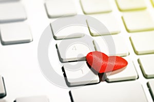 Red Hearts on a Keyboard. Love or Valentine`s Day Concept