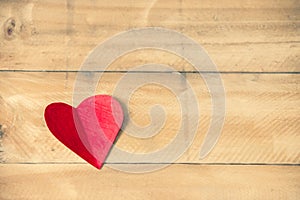 Red hearts paper on brown wooden table, Copy space to put messages on the Valentine`s Day