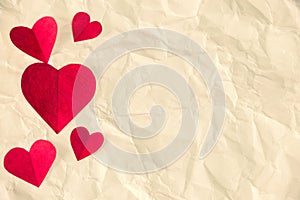 Red hearts paper on White crumpled paper, valentine`s day beautiful background