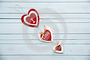 Red hearts on white background for Valentines Day.