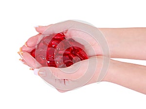 Red hearts in woman hands isolated on white