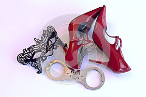 Red High Heels Black Mask Handcuffs photo