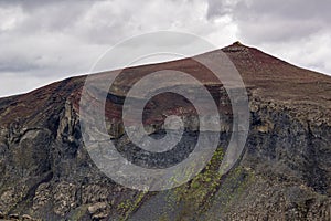 Red hill in Hafragil near Hafragilsfoss in Iceland