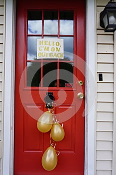 Red home door with Balloons on it