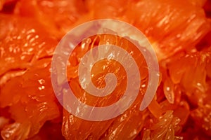 Red honey pomelo peeled and disassembled into slices