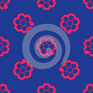 Red Honeycomb icon isolated seamless pattern on blue background. Honey cells symbol. Sweet natural food. Vector