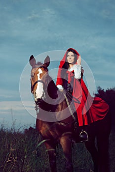 Red Hood Princess Riding a Horse