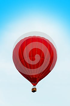 Red hot air ballon in the blue sky