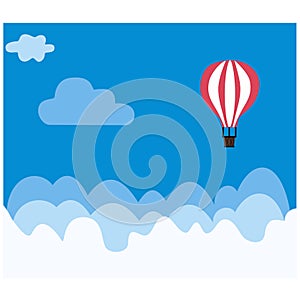 Red hot air balloon flying in the blue sky with clouds