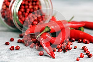 Red hot bird chili pepper with pepper corns