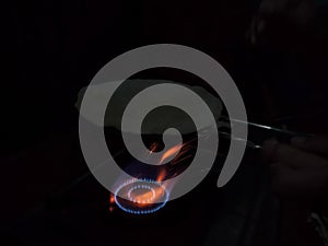 Red hot burning flames coming out of gas oven
