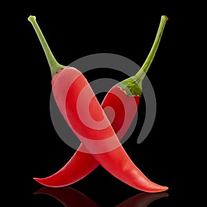 Red hot Chili pepper isolated on a black background