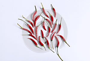 Red hot chili pepper on white table in nice composition