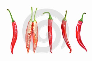 Red hot chili peppers. Chili pepper sliced, cross section. Four red long hot peppers and one chilli pepper sliced in