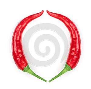 Red hot chili peppers isolated on white background. Letter O. Top view. Flat lay pattern