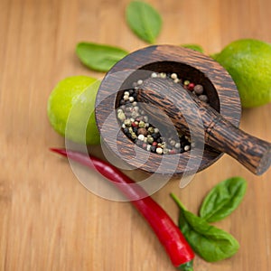 Red Hot Chili Peppers, lime and spices with Mortar and Pestle