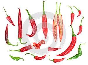 Hot chili peppers and cross section of long peppers. Small peppers, sliced peppers and different shapes of chili peppers