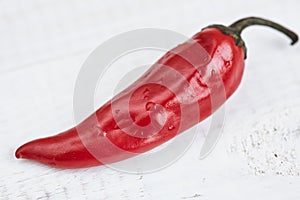 Red hot chili peppers on a white background