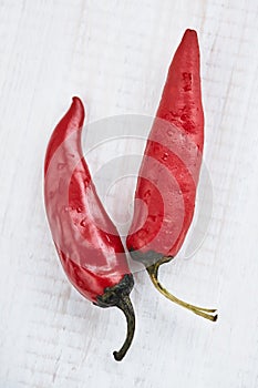 Red hot chili peppers on a white background