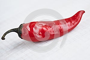 Red hot chili peppers on a white background