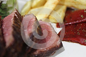 Red hot chilli peppers & beef steak photo