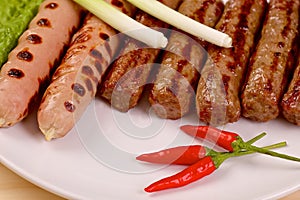 Red hot chilli peppers with grilled sausages and