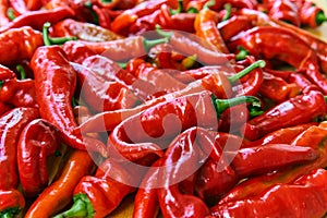 Red hot chilli peppers pattern texture background. Close up. Landscape. A backdrop ofRed hot chilli peppers. Street