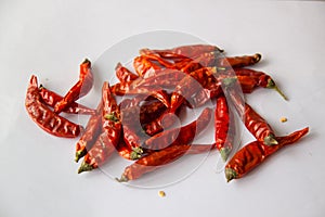 Red hot chilly pepper background,Dry peppers with the words ` hot `.