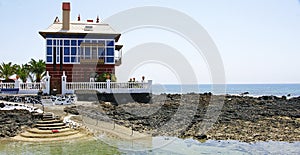 Red house on the beach of Arrieta, Lanzarote photo