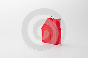 Red house model on white background. Real estate industry. Real estate and property concept