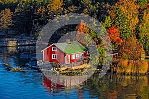 Red house on rocky shore of Ruissalo island, Finland