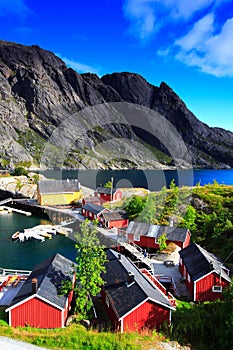 Red houses, cliffs and sea