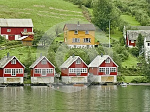 Red houses on Fjord river