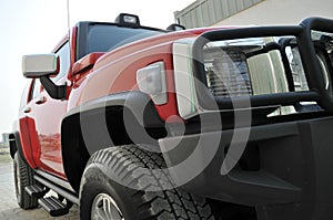 Red Hummer H3 Side