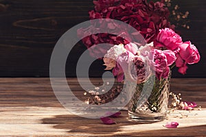 Red hydrangea flowers and pink roses