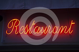 Red Illuminated Restaurant Sign