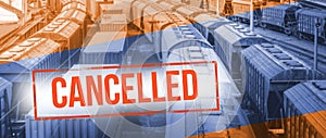 Red inscription cancelled on a blurred  background  railway wagons  in port.