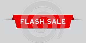 Red inserted label with word flash sale on gray background