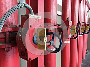 Red iron fire pipe and switch for water set line up in a long row.