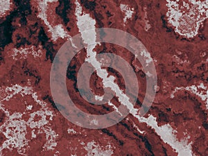 Red iron oxide texture. Stone background