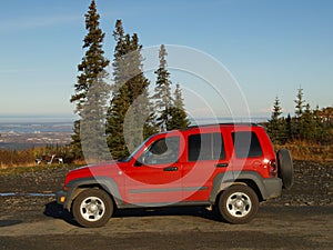 Red jeep at Anchorage overlook