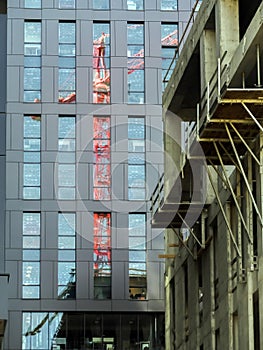 Red jib crane reflection