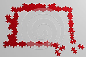 Red jigsaw puzzle frame, partially disassembled.