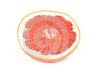 Red juicy grapefruit isolated on white