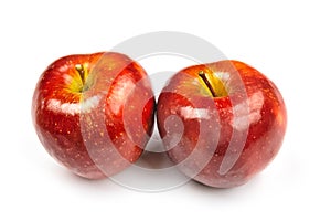 Red juicy ripe fresh apples isolated on a white background