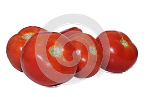 Red juicy tomatoes isolated on a white background. Healthy eating. Delicious vegetables