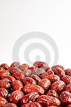 Red jujubes isolated on white background