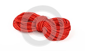 Red jute twine coil skein isolated on white