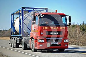 Red Kamaz Truck T1840 Tank Container Transport on Sunny Day