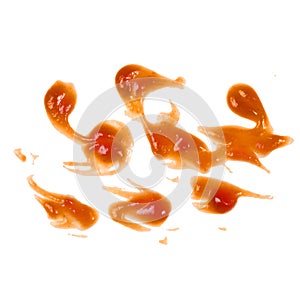 Red ketchup splashes isolated